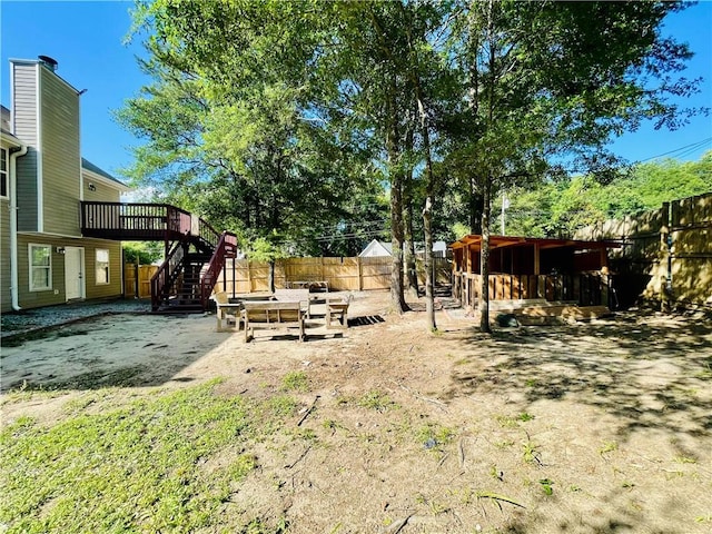 350 Fall View Ct, Winder, GA 30680 - view of yard with stairway, a deck, and a patio
