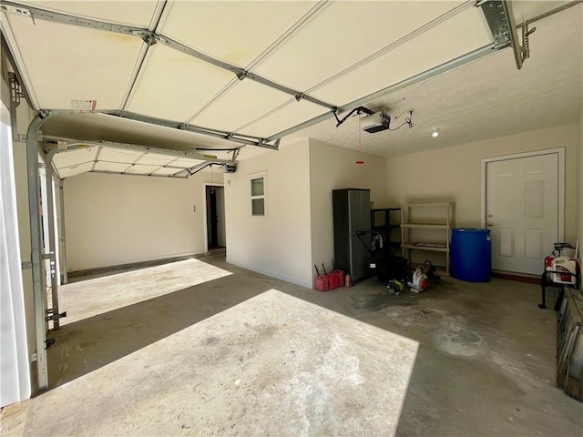 350 Fall View Ct, Winder, GA 30680 - garage featuring a garage door opener