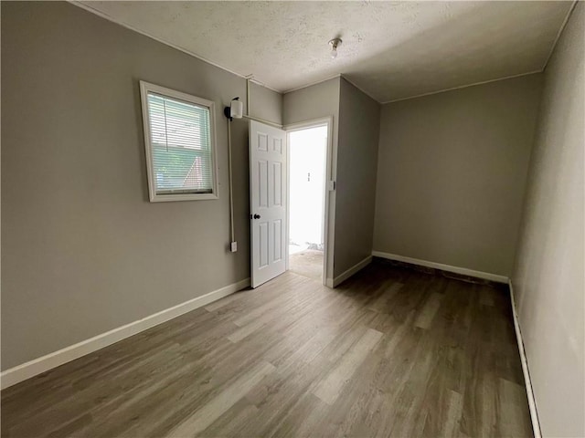 350 Fall View Ct, Winder, GA 30680 - unfurnished room featuring wood finished floors and baseboards