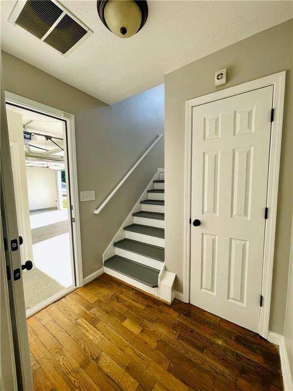 350 Fall View Ct, Winder, GA 30680 - staircase featuring hardwood / wood-style flooring and baseboards