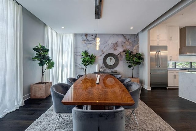 dining area featuring dark hardwood / wood-style floors