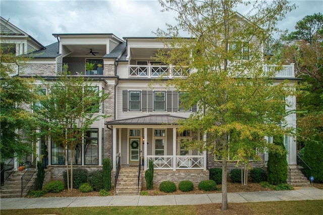 view of front of house with a porch and ceiling fan