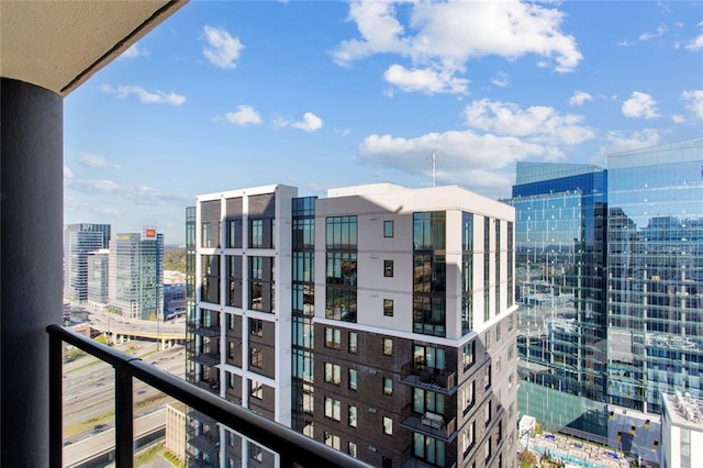 balcony featuring a view of city