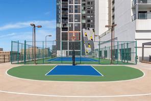 view of sport court with community basketball court and fence