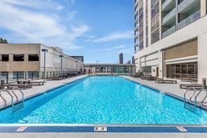 community pool with a patio