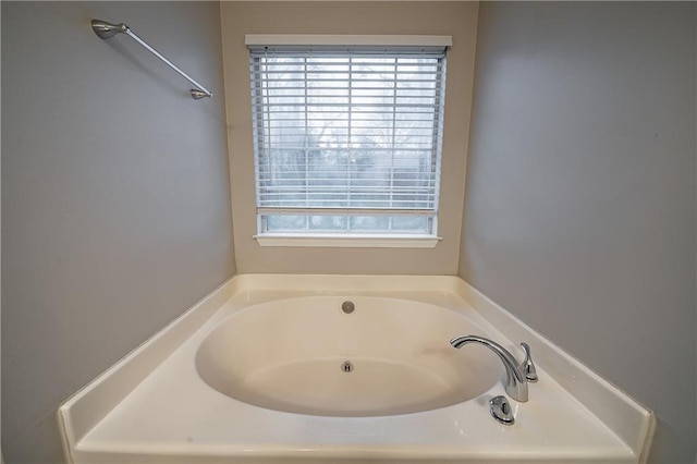 bathroom featuring a garden tub