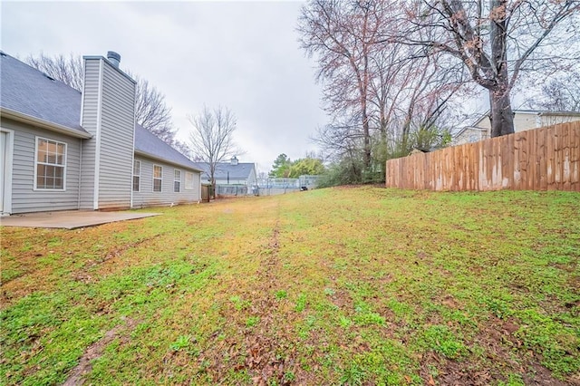 view of yard with a patio area and fence