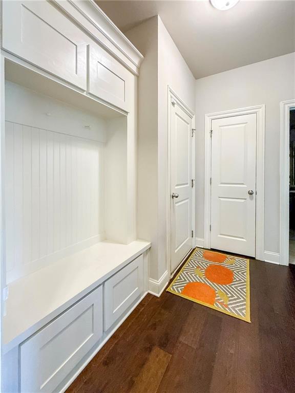 724 Laura Jean Ct, Buford, GA 30518 - mudroom with dark wood-style flooring and baseboards