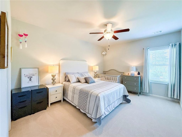 724 Laura Jean Ct, Buford, GA 30518 - bedroom featuring light carpet, ceiling fan, and baseboards