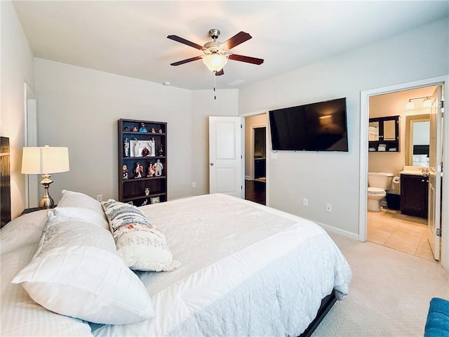 724 Laura Jean Ct, Buford, GA 30518 - bedroom with light carpet, connected bathroom, ceiling fan, and light tile patterned floors