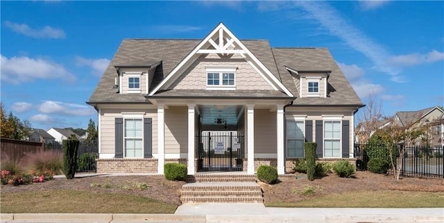724 Laura Jean Ct, Buford, GA 30518 - view of front facade with a porch and brick siding