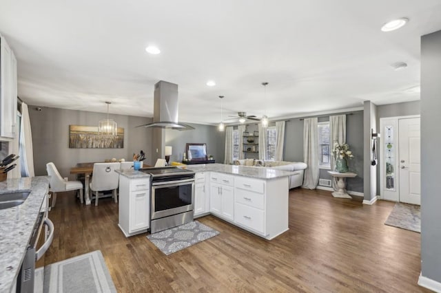 kitchen with island range hood, dark wood-style flooring, white cabinets, open floor plan, and electric stove