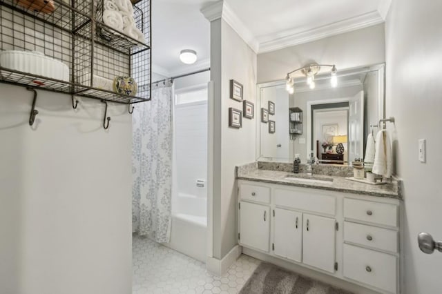 bathroom with baseboards, ornamental molding, shower / tub combo with curtain, and vanity