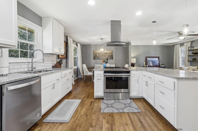 kitchen featuring a sink, appliances with stainless steel finishes, dark wood-style flooring, and island exhaust hood