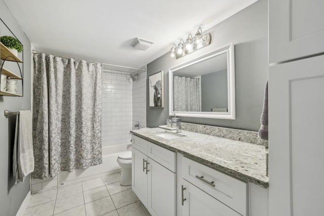 full bath featuring toilet, vanity, visible vents, tile patterned floors, and shower / tub combo with curtain