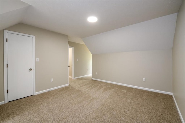 bonus room with vaulted ceiling, carpet, baseboards, and recessed lighting