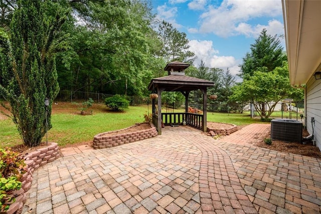 view of patio with a gazebo and central AC