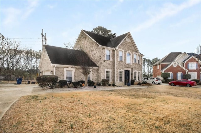 view of front of home with a front lawn