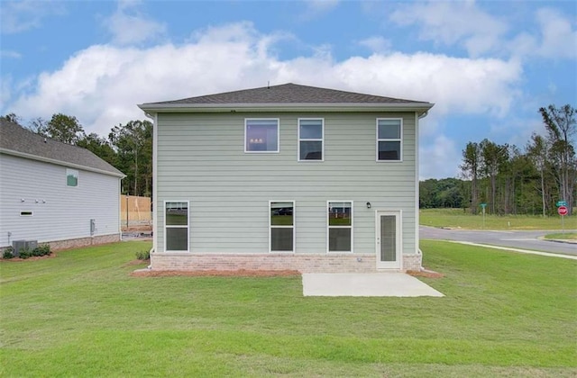 back of house with a patio area, cooling unit, and a yard