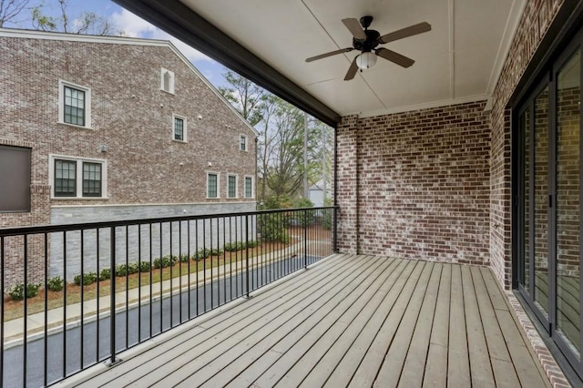 wooden deck with ceiling fan