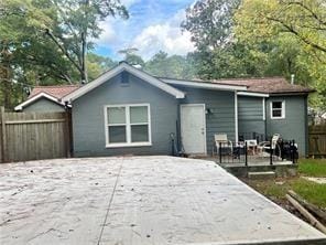 back of house with a patio