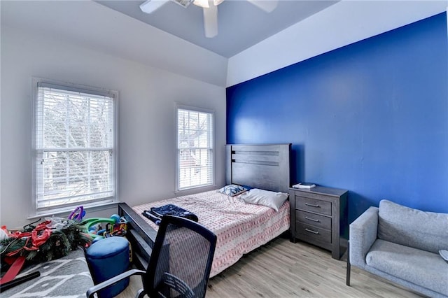 bedroom featuring ceiling fan and wood finished floors