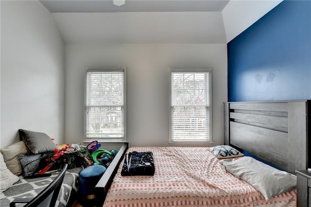 bedroom featuring multiple windows