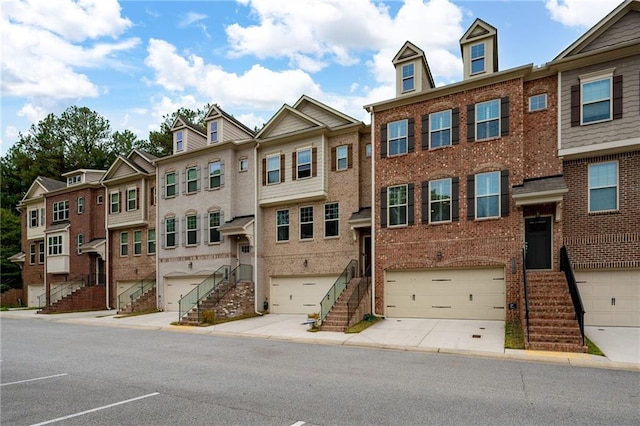 multi unit property featuring a garage