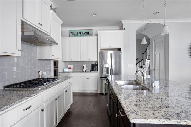 244 Rope Mill Rd, Woodstock, GA 30188 - kitchen featuring stainless steel appliances, a sink, under cabinet range hood, and white cabinetry