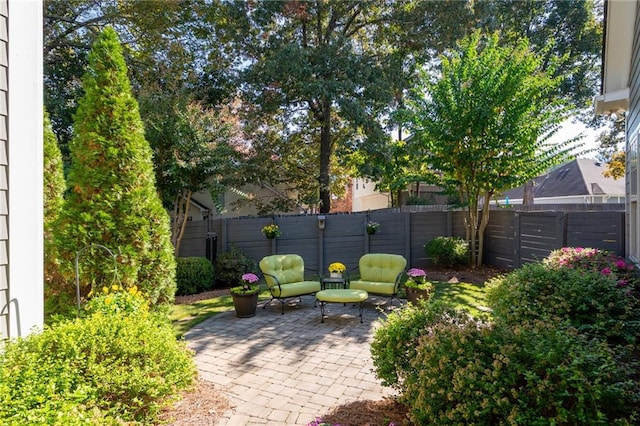 244 Rope Mill Rd, Woodstock, GA 30188 - fenced backyard featuring a patio area