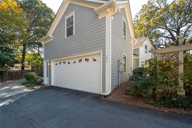 244 Rope Mill Rd, Woodstock, GA 30188 - view of home's exterior with an attached garage and driveway