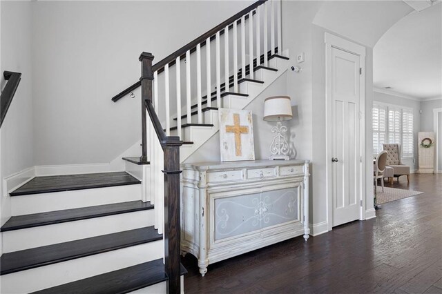 244 Rope Mill Rd, Woodstock, GA 30188 - stairs featuring baseboards, wood finished floors, and arched walkways
