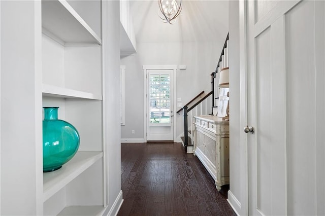 244 Rope Mill Rd, Woodstock, GA 30188 - entrance foyer featuring dark wood-style floors, baseboards, and a chandelier