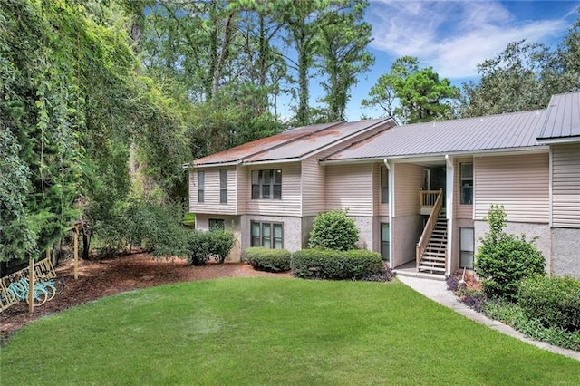 view of front of home with a front lawn