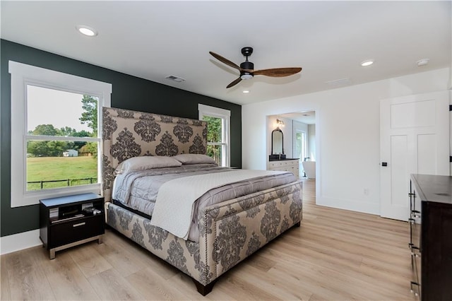 bedroom featuring light hardwood / wood-style floors and ceiling fan