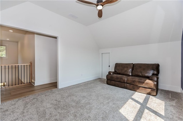 sitting room featuring carpet, ceiling fan, and lofted ceiling