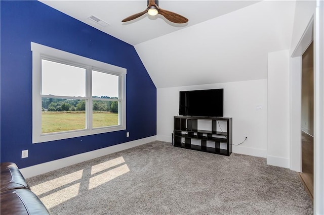 additional living space featuring carpet floors, vaulted ceiling, and ceiling fan