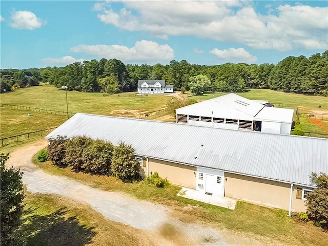 birds eye view of property featuring a rural view