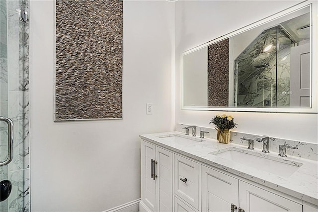 bathroom featuring walk in shower and vanity