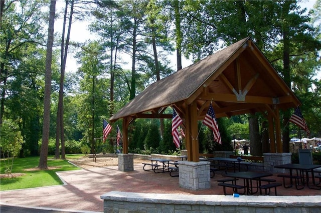 view of community with a patio area and a gazebo