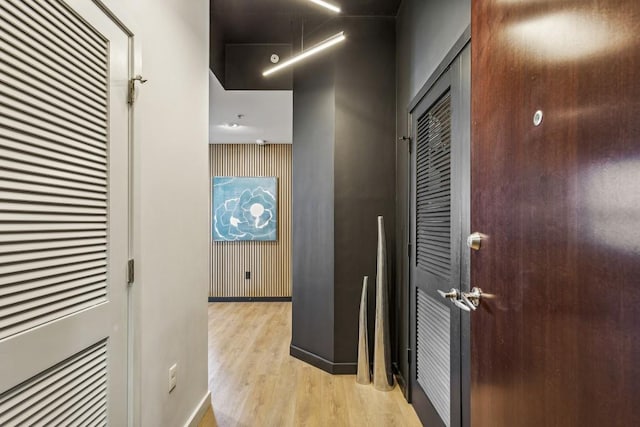 hallway with light wood-type flooring