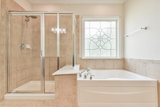 full bathroom with a shower stall and a garden tub
