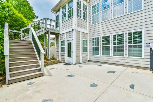view of patio featuring stairs