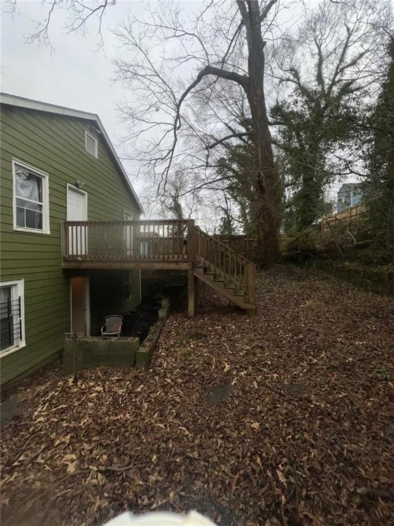 view of yard featuring a deck