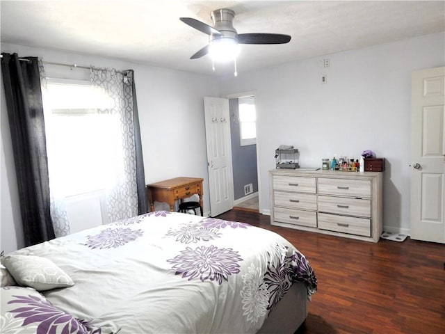 bedroom featuring ceiling fan and dark hardwood / wood-style flooring