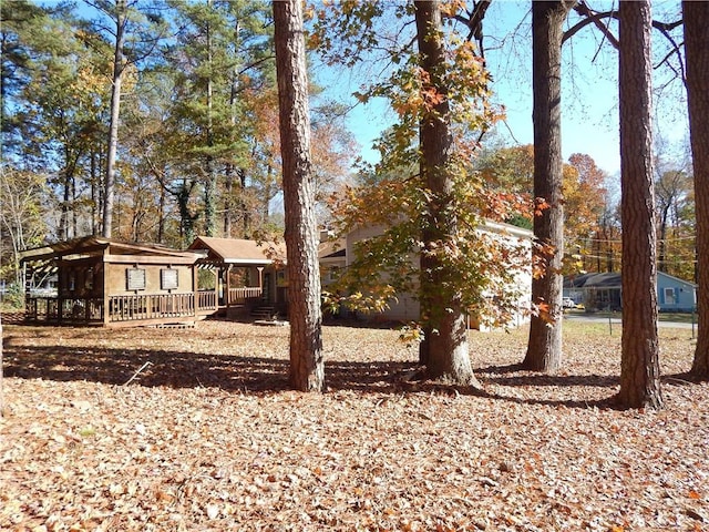 view of yard with a deck