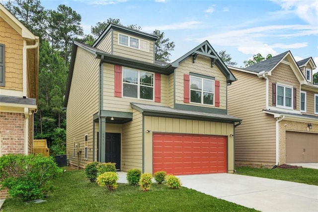 6571 Splitpine Ct, Atlanta, GA 30349 - view of front facade featuring a garage, driveway, cooling unit, and board and batten siding