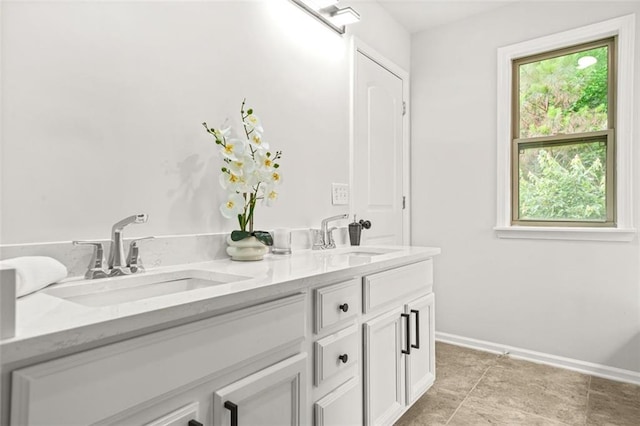 6571 Splitpine Ct, Atlanta, GA 30349 - full bath with double vanity, baseboards, and tile patterned floors