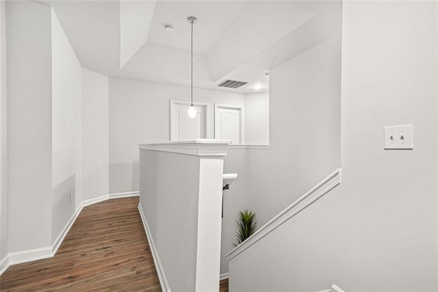 6571 Splitpine Ct, Atlanta, GA 30349 - corridor with a raised ceiling, wood finished floors, and baseboards