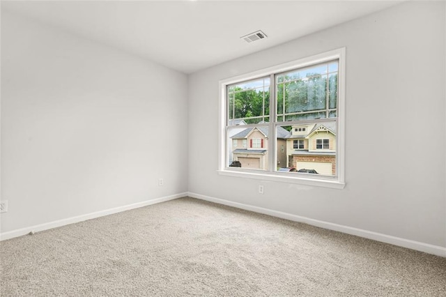 6571 Splitpine Ct, Atlanta, GA 30349 - carpeted empty room with baseboards